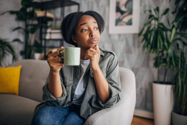 istock Woman enjoying a coffee in cozy setting 2154927644