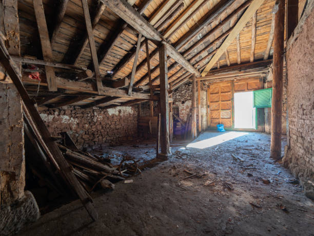 istock A large, empty room with a wooden floor and a wooden ceiling 2154930651