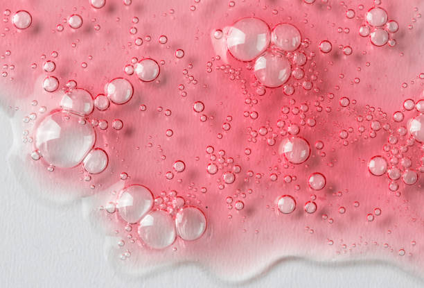 istock Red pink liquid texture with bubbles .Oil, gel , aid, serum swatch 2154933552