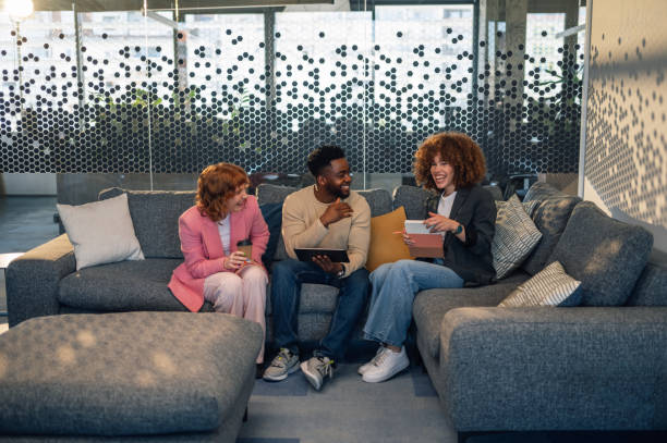 istock Interracial businesspeople with tablet collaborating on start up project 2154933870