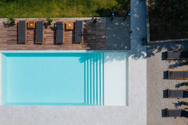 istock Modern pool in a summer house 2154934034