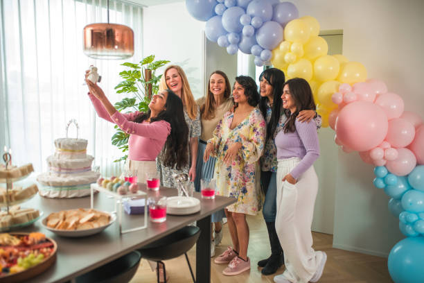 istock Diverse Friends Celebrate with Polaroid Selfies 2154934952