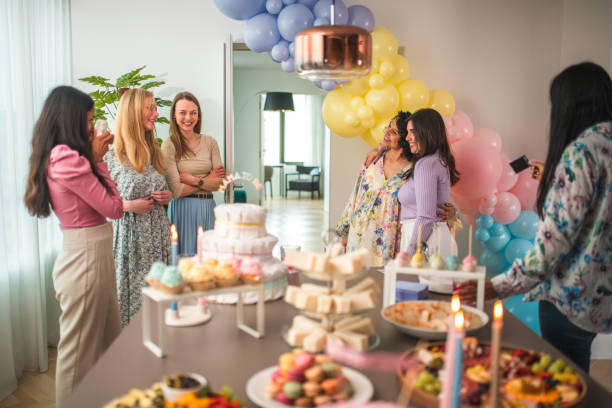 istock Diverse Friends Enjoying a Baby Shower Together 2154934953