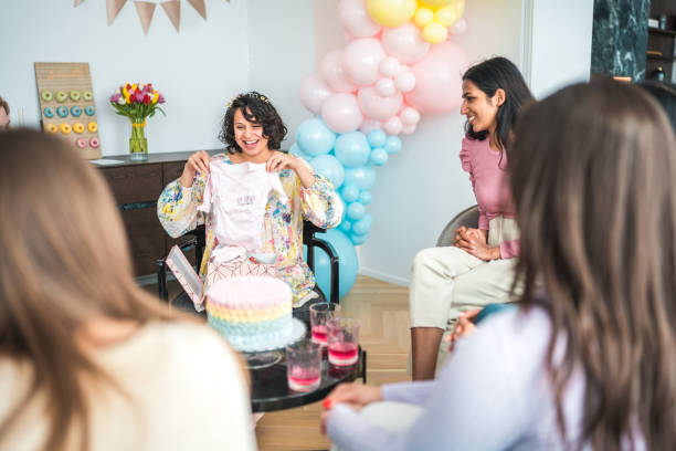 istock Celebratory Baby Shower with Expectant Hispanic Mother 2154934961