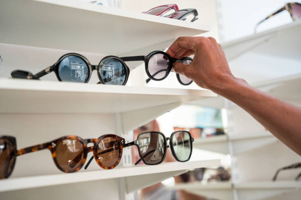 istock Mixed Race Woman Browsing Frames at Eyeglass Store 2154934983