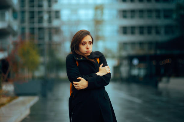 Woman Feeling Cold Wondering in a Big City