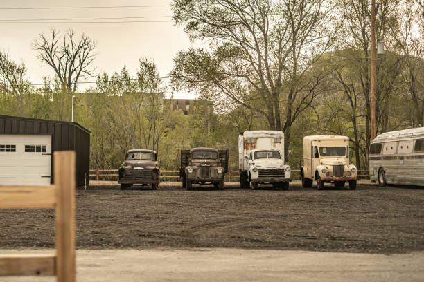 Old Vintage Rustic Vehicles Outside Parking Lot