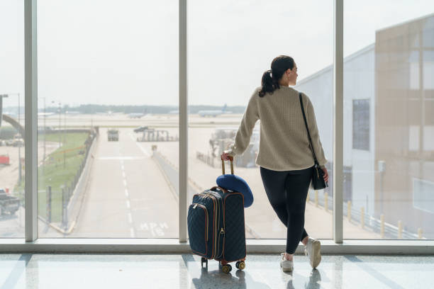 istock Woman traveling alone 2154937423