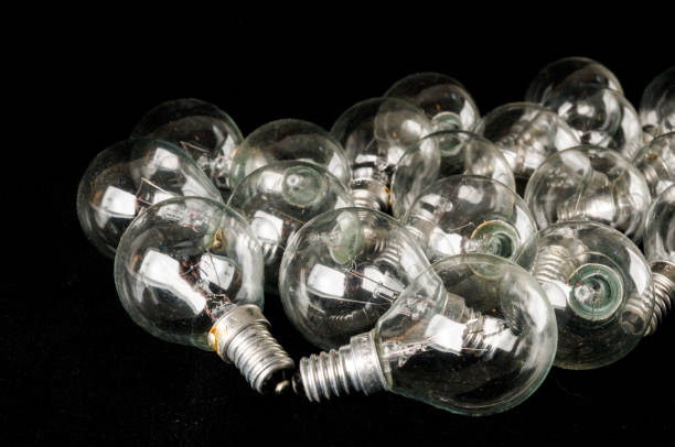 istock Background with a lot of light bulbs 2154937461