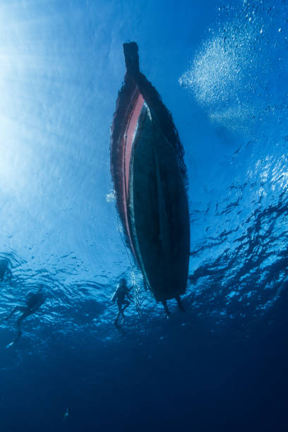 istock silhouette view boat from the bottom underwater 2154947016