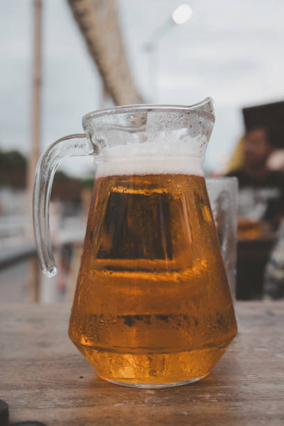 istock Full pitcher of beer. Drinking alcohol at open air 2154947839