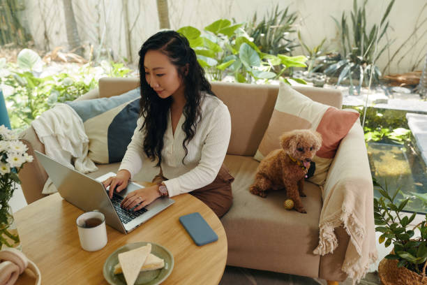 istock Woman Working on Laptop at Home 2154949996