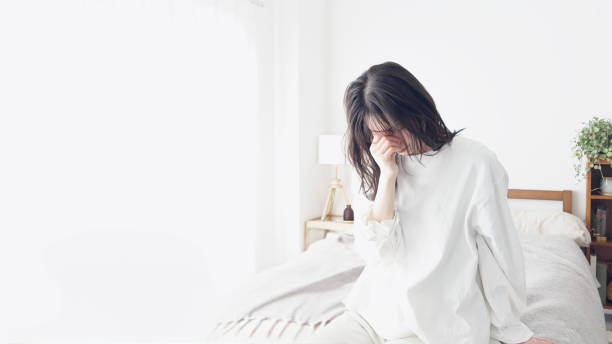 istock A woman holding her tired eyes 2154951506