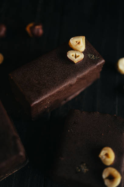 istock Halva in chocolate at dark background with nuts 2154952571