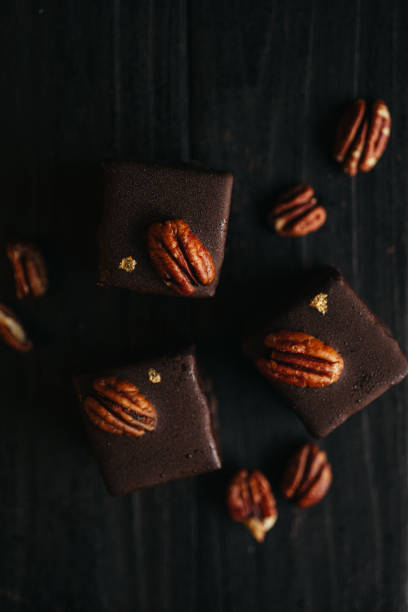 istock Halva in chocolate at dark background with nuts 2154952586