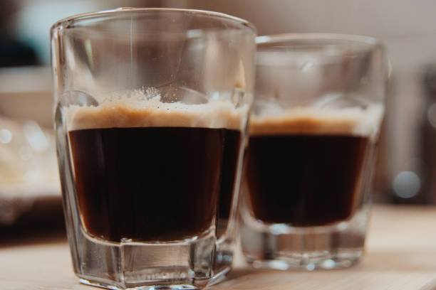 istock Two Espresso Coffee Glasses on a Counter 2154956459