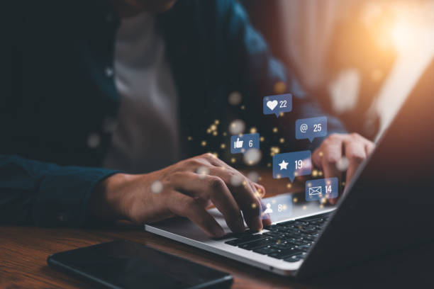 istock Man using laptop with social media notifications internet online and digital marketing technology concept. 2154958765
