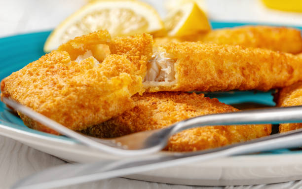 istock crispy baked battered pollock fillet on a plate 2154959499