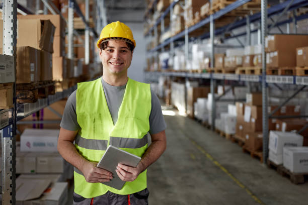 istock Happy warehouse worker in supply chain. 2154960939