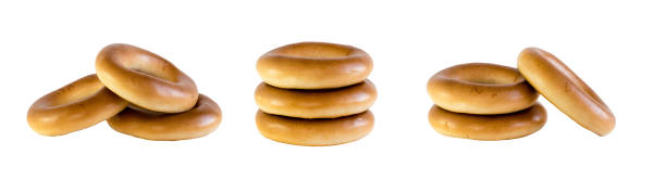 istock Bagels baked goods on white isolated background 2154961182