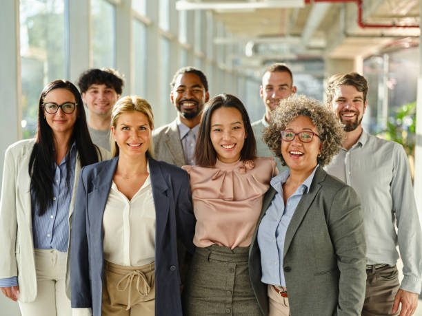 istock Happy business colleagues in the office. 2154962521