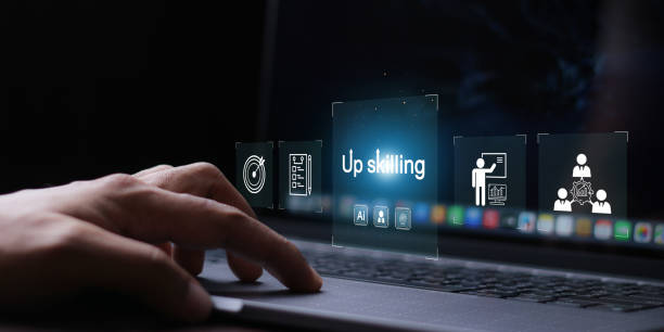 istock Upskilling concept. Businessman touching skills icon on virtual screen. Learning new and enhanced skills for career development. 2154963122