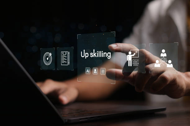 istock Upskilling concept. Businessman touching skills icon on virtual screen. Learning new and enhanced skills for career development. 2154963219
