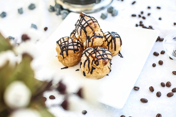 istock White Plate With Chocolate-Covered Cookies 2154963410