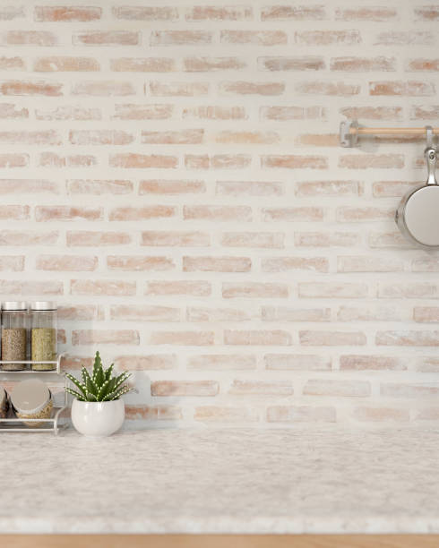 istock A showcasing space on a white marble tabletop against the brick wall in a Scandinavian kitchen. 2154966786