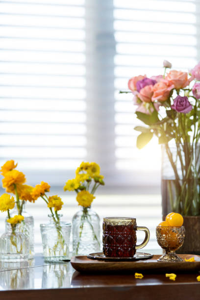 Coffee and bouquet on the table