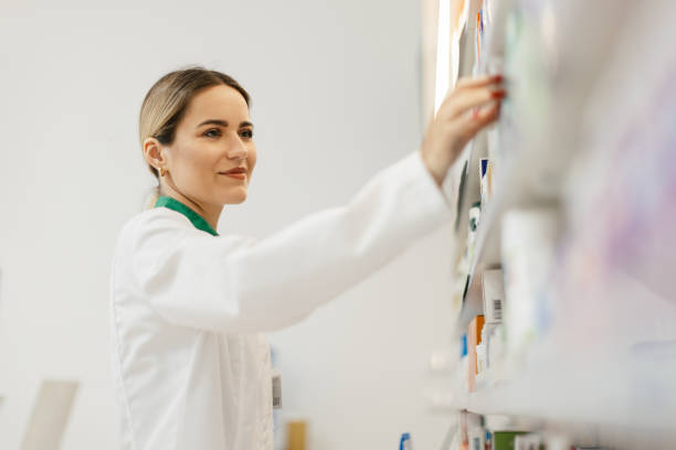 istock Young woman pharmacist at her workplace 2154969311