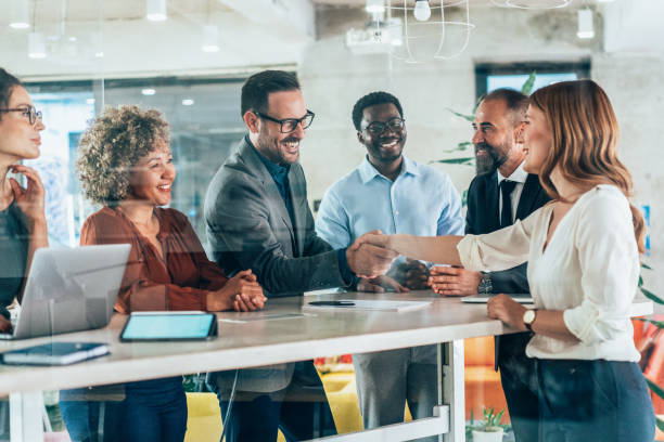 istock Shaking hands with new colleague 2154969752
