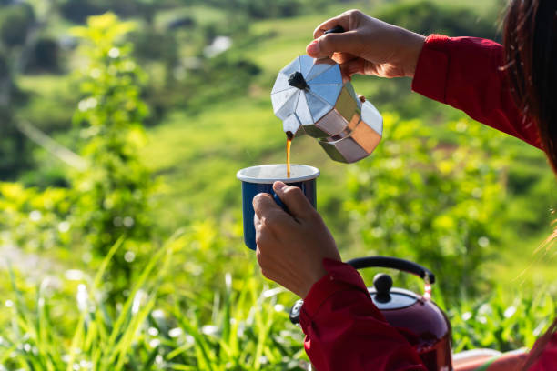 istock Making drip coffee with a beautiful mountain and nature view in background 2154970005