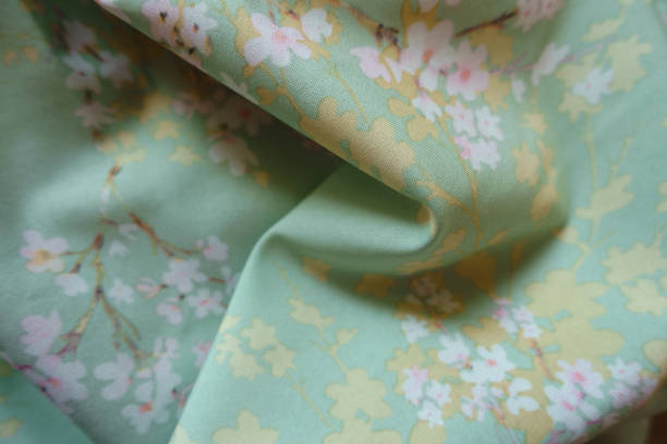 istock Pale mint green rayon fabric in soft folds 2154970640