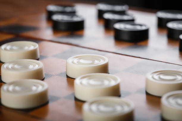 istock checkerboard with checkers. Game concept. Board game. Hobby. checkers on the playing field for a game. 2154972730