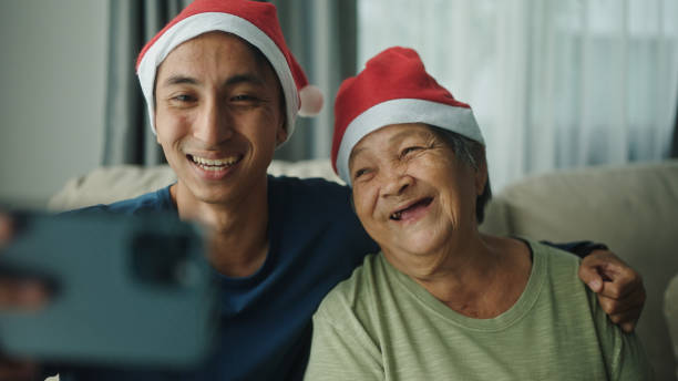 istock Family taking a selfie at christmas day. 2154972748