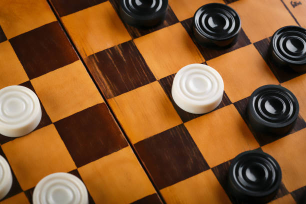 istock checkerboard with checkers. Game concept. Board game. Hobby. checkers on the playing field for a game. 2154972754