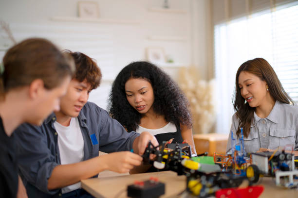 istock Group of college students are developing their machinery project. 2154973934