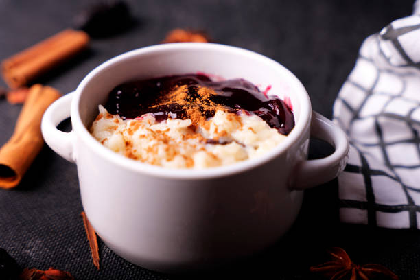 istock Rice pudding and purple mazamorra accompanied by star cinnamon. 2154975243