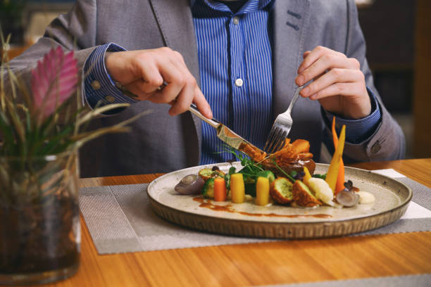 istock Businessman eating diner 2154975437