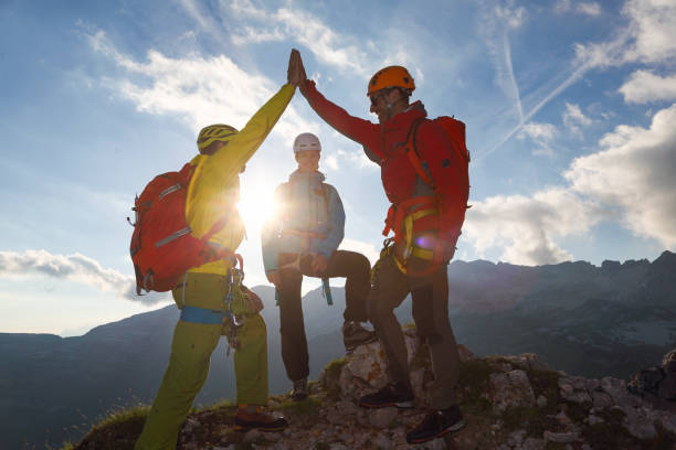 istock Mountaineers celebrating on the top 2154978620