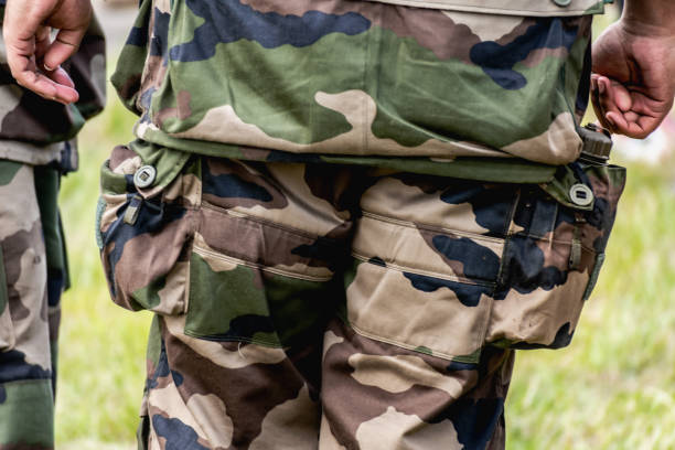 istock French soldier seen from behind with his equipment and camouflage uniform 2154982965