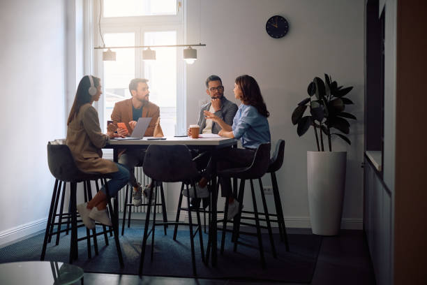 istock Start up team communicating during a meeting at casual office. 2154984388