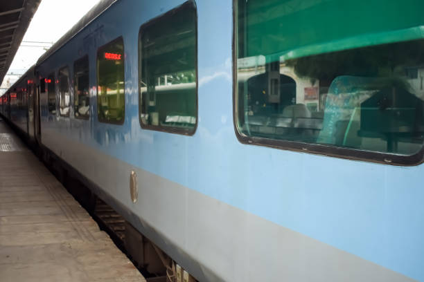 istock Amritsar, India, May 03 2024 - Indian railway train at Amritsar railway station platform during morning time, Colourful train at Amritsar, Punjab railway station 2154986682