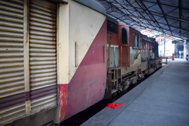 istock Amritsar, India, May 03 2024 - Indian railway train at Amritsar railway station platform during morning time, Colourful train at Amritsar, Punjab railway station 2154986694