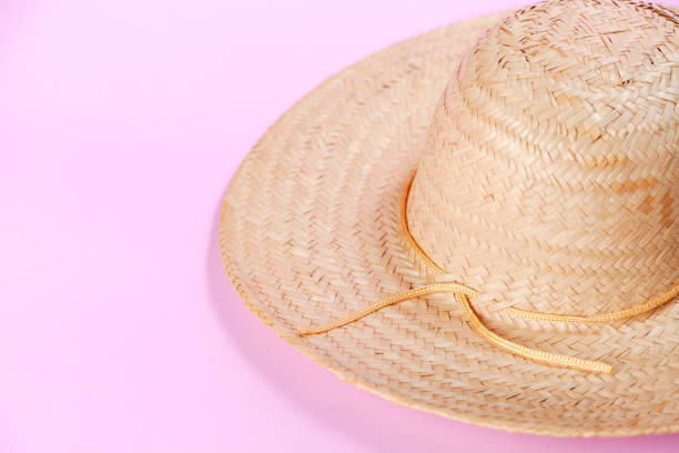 istock Straw sombrero on pink background 2154987539