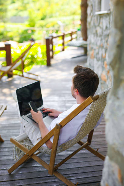 istock Young Businessman Working Comfortably in Nature, Freelance Worker ,Flexible Working, Working From At Home 2154988793