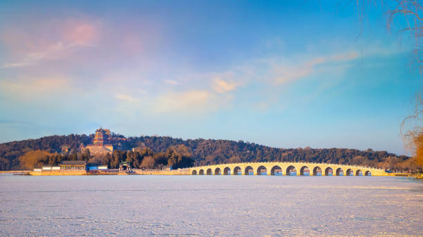 Beijing, China - Jan 13 2020: Seventeen-Arch Bridge at Summer Palace, connects the eastern shore of Kunming Lake and Nanhu Island in the west, built during the reign of Emperor Qianlong