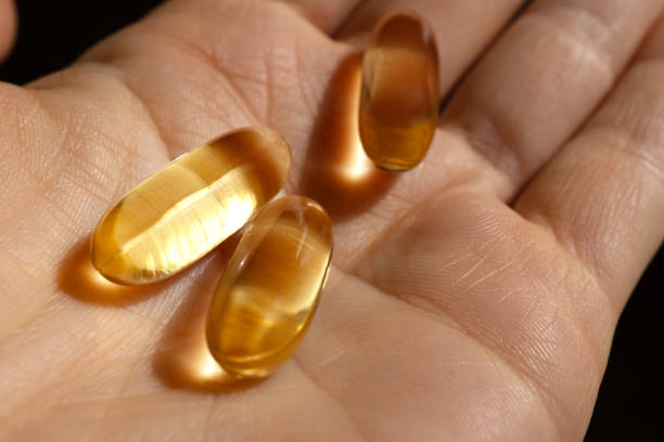 istock Vitamin D capsules are on hand 2154994469