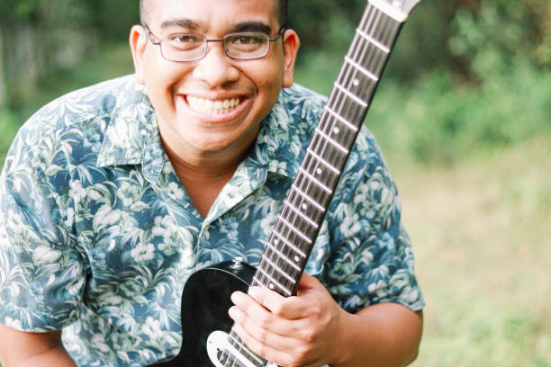 Thai male guitarist